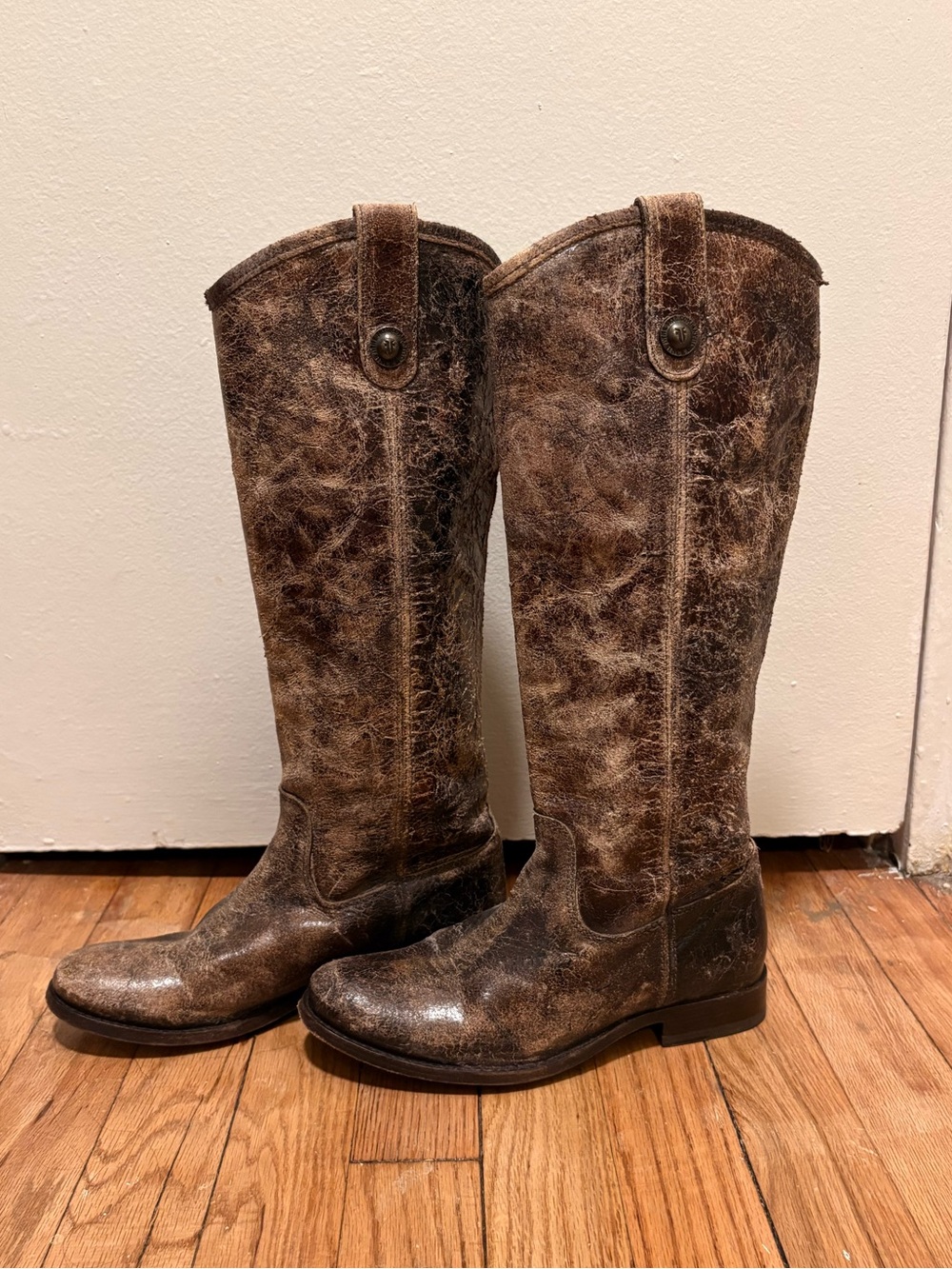 Frye brown leather knee-high boots with distressed texture